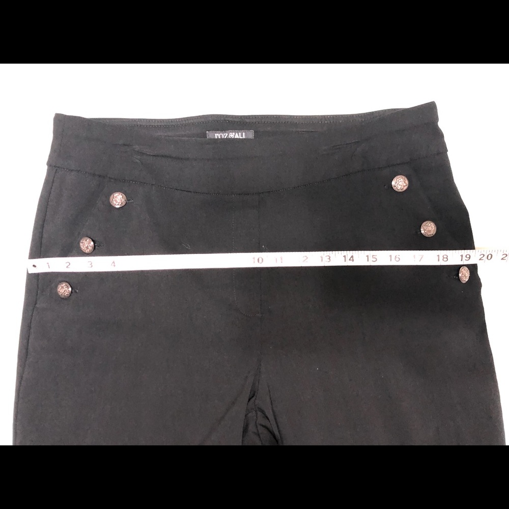 Black pants with silver buttons